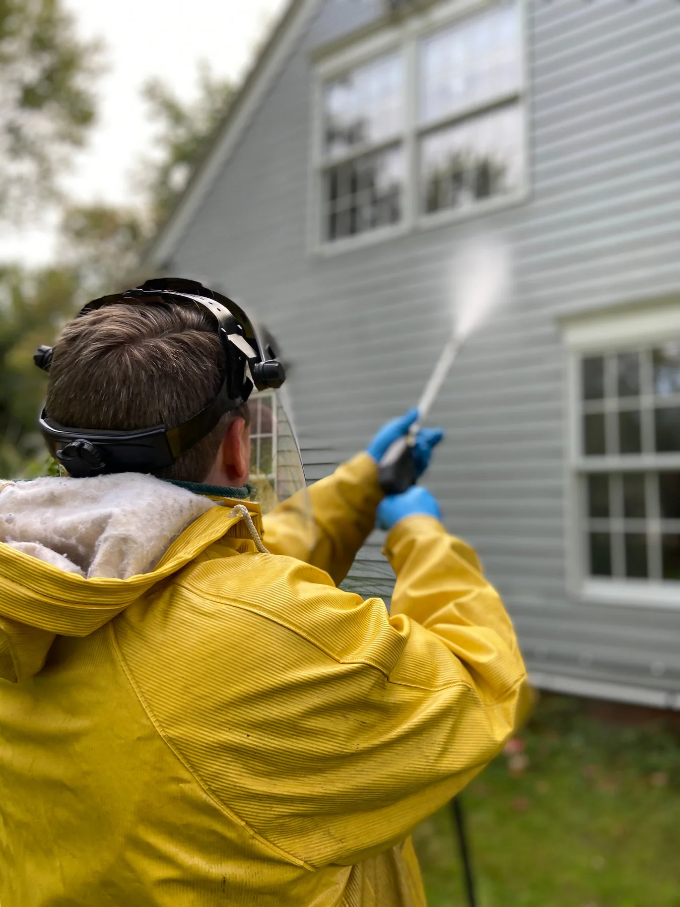 Exterior house washing in progress, shown as general service imagery